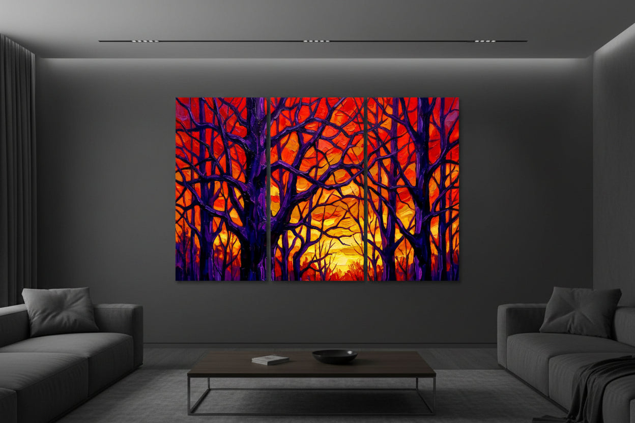 A high-resolution triptych canvas print titled 'Autumn Falls' showing a stylized impressionist forest with dark purple silhouettes against a glowing orange and red sunset sky, gallery-wrapped on wooden frames.